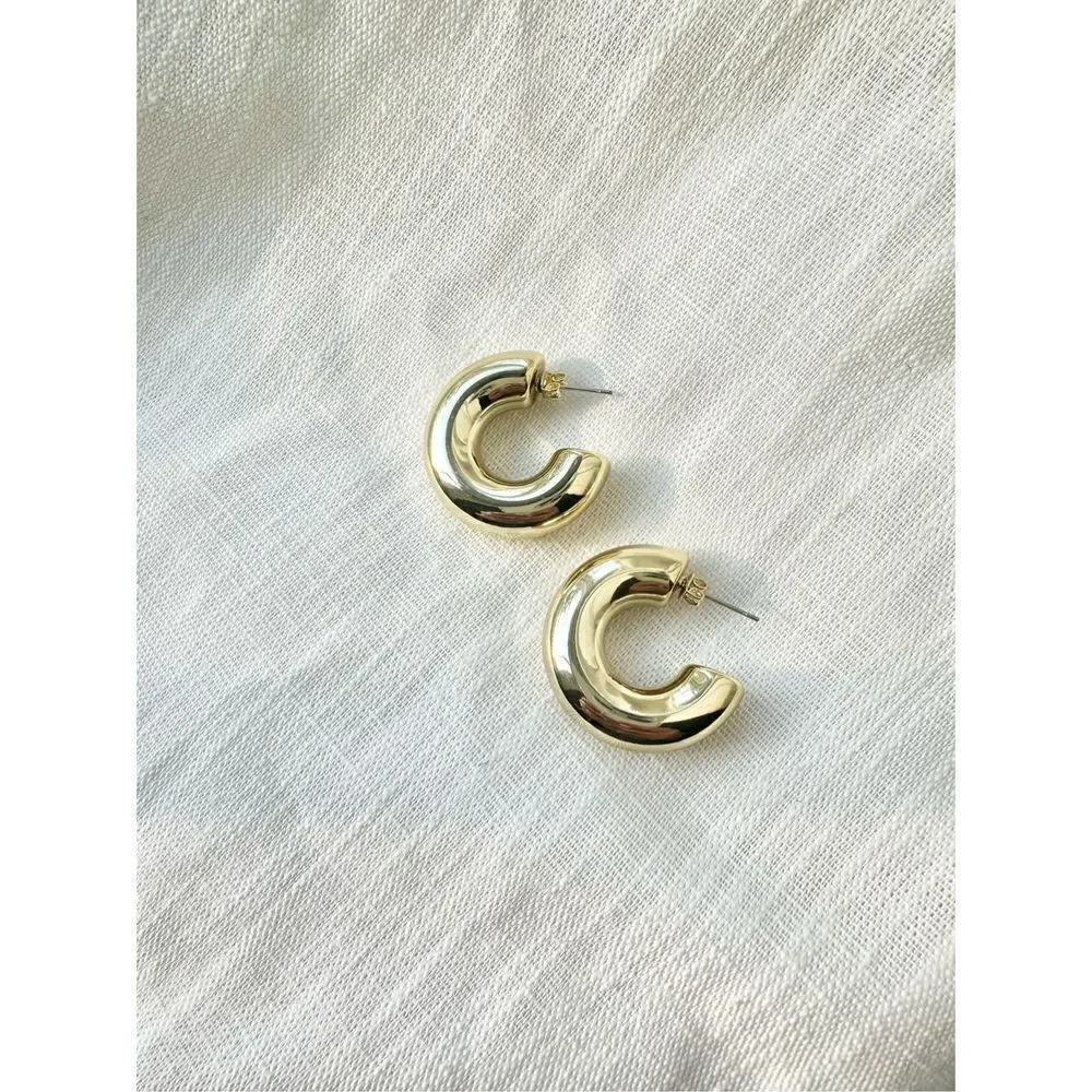 Minimalistic gold modern sleek hoops